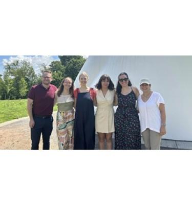 Audrey Desnain, Layne Schaffer, Samantha Wert, Alex Taylor and Rachel Klipa take a group photo at the Carol R. Brown sculpture garden.